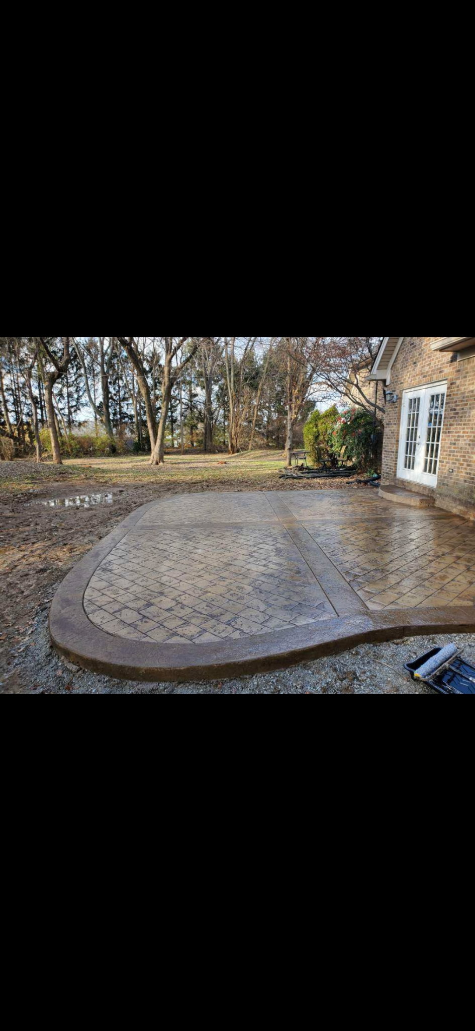 Decorative stamped concrete patio at residential property