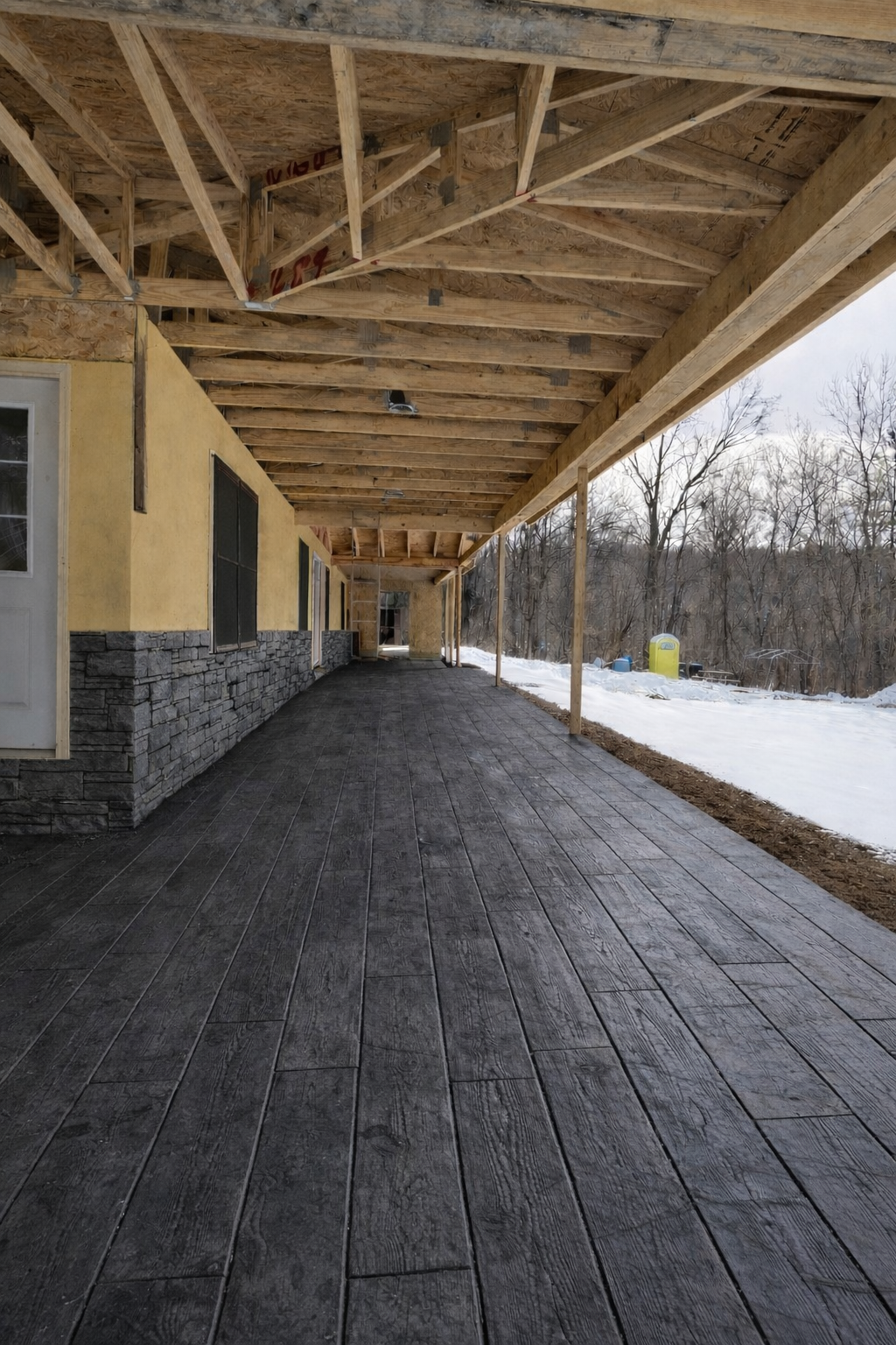 Stamped concrete porch and walkway installation